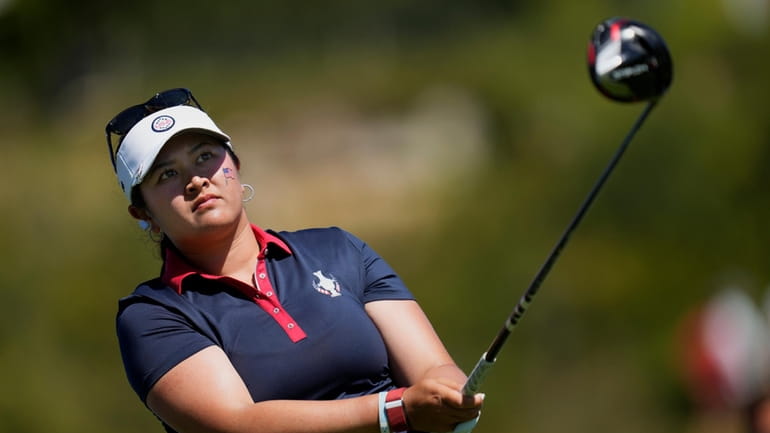 United States' Lilia Vu plays her tee shot on the...