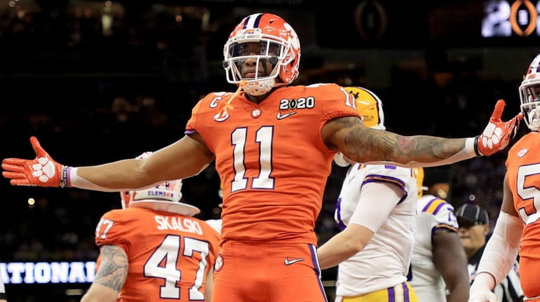 Isaiah Simmons of the Clemson Tigers celebrates a defensive stop...