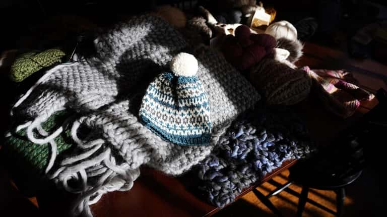 Professional knitter Kate Preston's collection of custom-knit baby and dog...