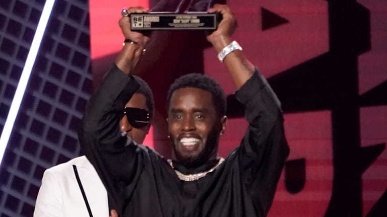 Sean "Diddy" Combs accepts the lifetime achievement award at the...