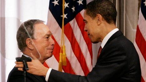 New York Mayor Michael Bloomberg, left, shakes hands with Barack...