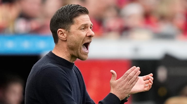 Leverkusen's head coach Xabi Alonso reacts during a German Bundesliga...