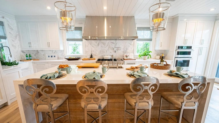 For the showhouse kitchen, designer Gary Ciuffo installed a brushed metal...