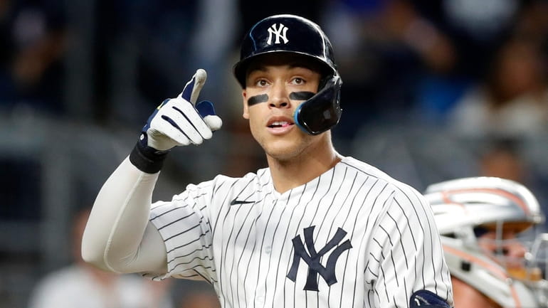 The Yankees' Aaron Judge had an American League record 62...