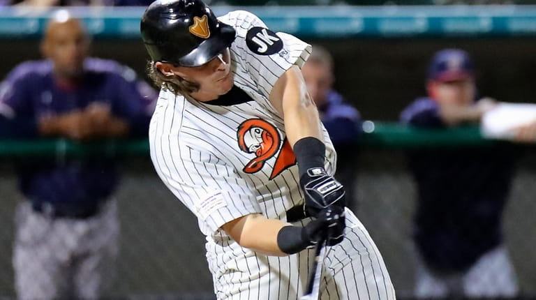 Long Island Ducks Taylor Ard drives a double to center...