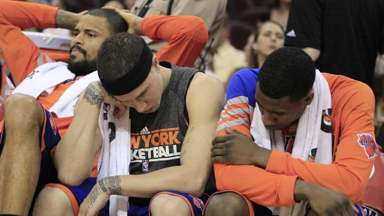 Knicks' Tyson Chandler, Mike Bibby and Iman Shumpert, left to...