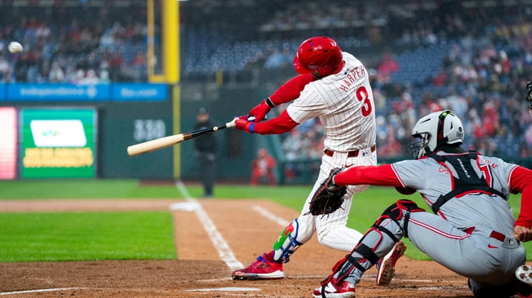 Philadelphia Phillies' Bryce Harper hits a solo home run during...