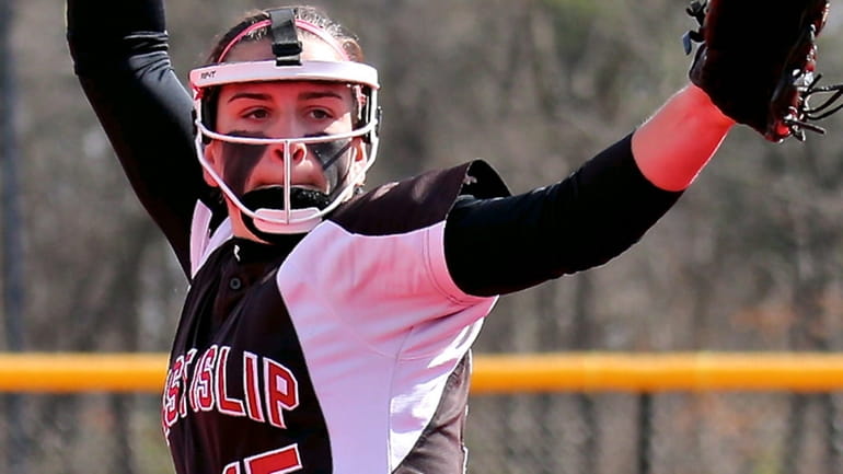East Islip starting pitcher Kyra Kreuscher delivers a pitch against...