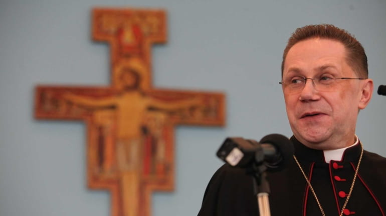 Bishop-elect Andrzej Jerzy Zglejszewski, 52, is introduced at St. Agnes...
