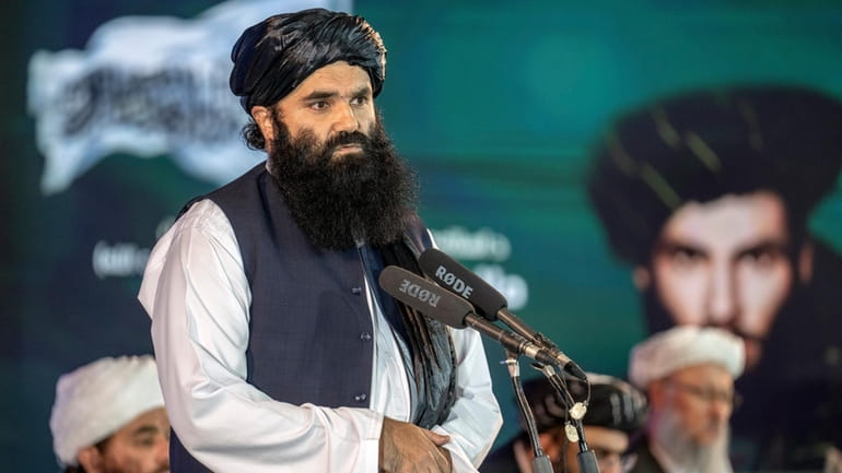 Afghan Taliban's Acting Minister of Interior Sirajuddin Haqqani speaks during...