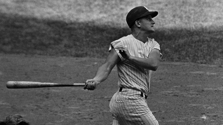The Yankees' Roger Maris, with a count of two balls,...