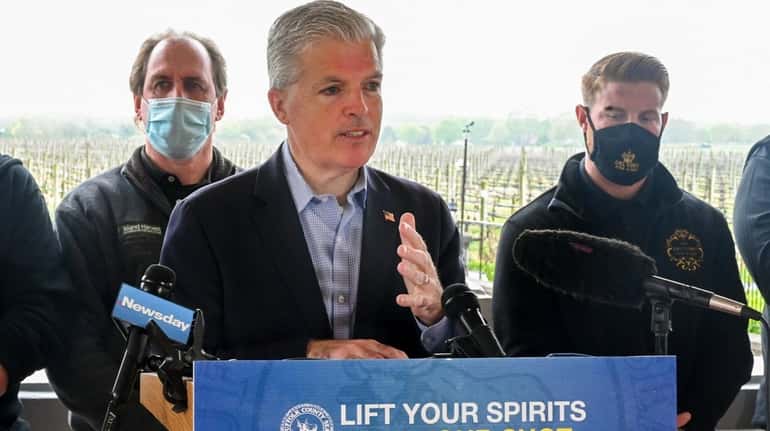 Suffolk County executive Steve Bellone speaks at Raphael Winery in...