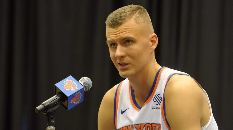 Knicks forward Kristaps Porzingis fields questions during media day at Madison...