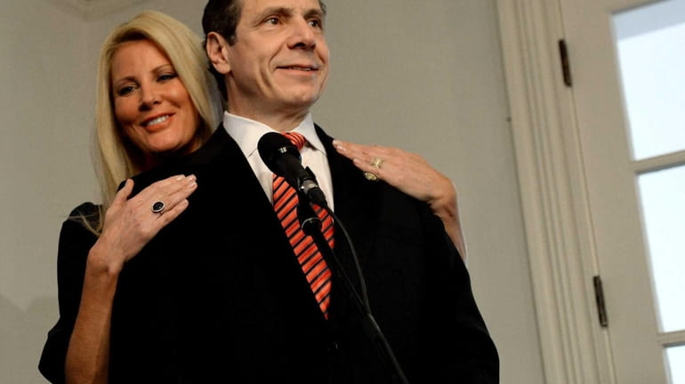 Gov. Andrew M. Cuomo stands with his girlfriend Sandra Lee...