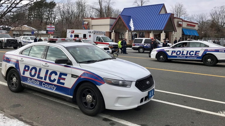 Police respond Monday to a shooting at IHOP on Portion...
