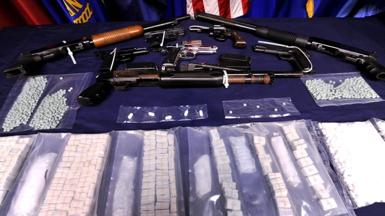 Heroin, narcotics and weapons seized from a recent drug bust....