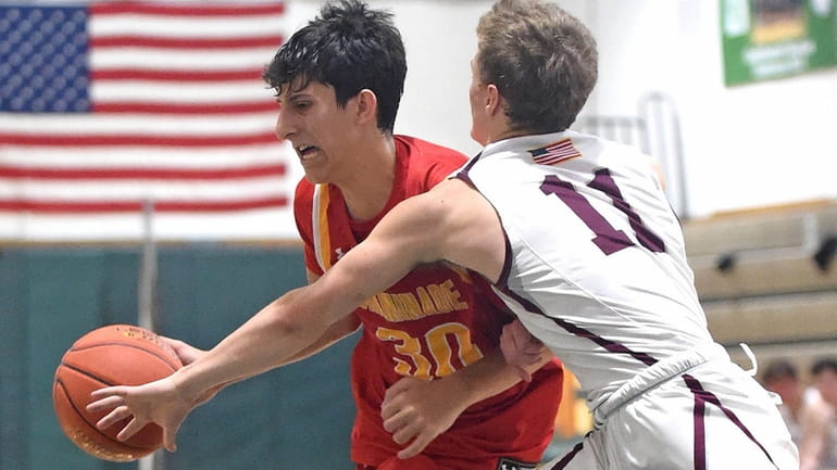 Antoni Vlogianitis of Chaminade, left, looks to get inside the paint...