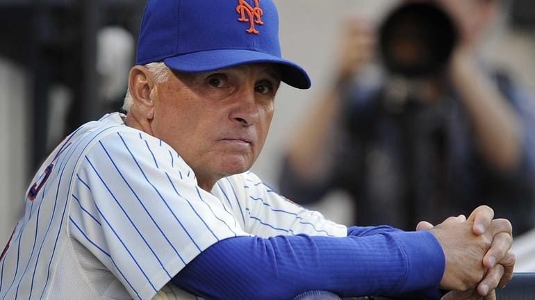 Mets manager Terry Collins looks on from the dugout before...