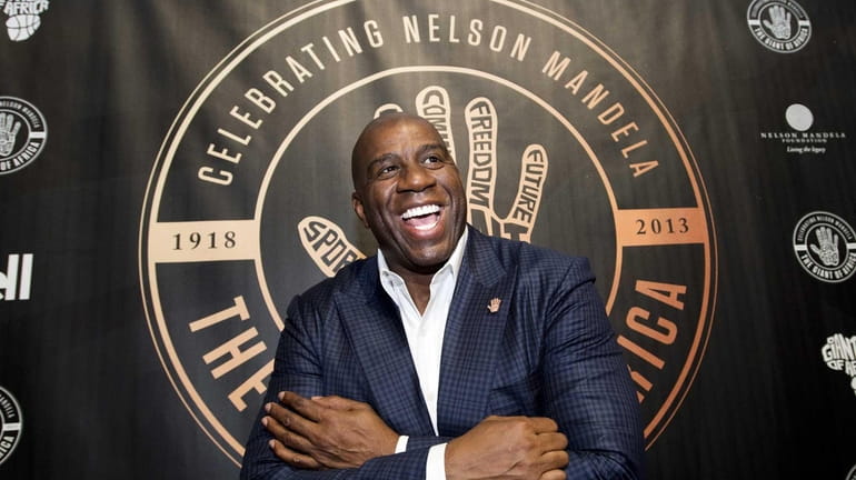 Magic Johnson pays tribute to Nelson Mandela on the first...