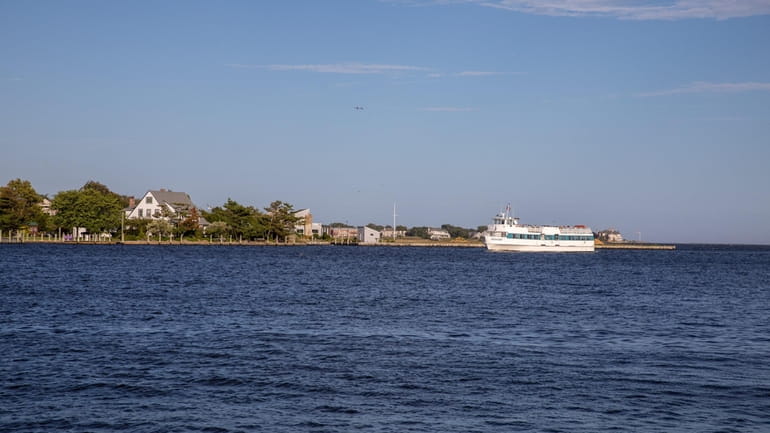 A ferry from Fire Island makes its way to the Bay...