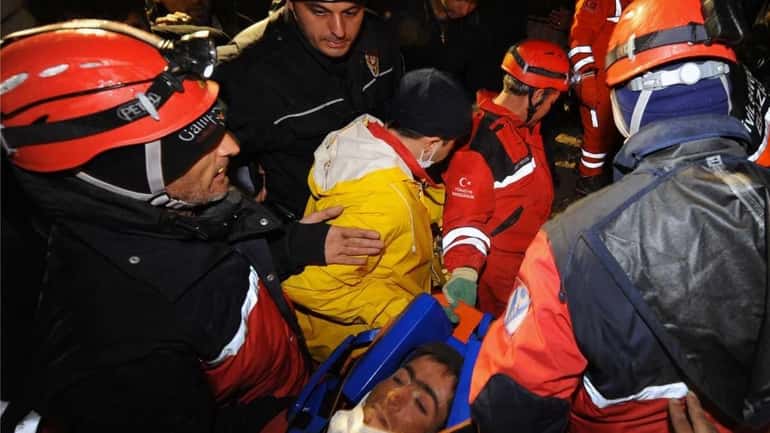 Turkish rescuers pulled out alive 18-year-old Imdat Padak from the...