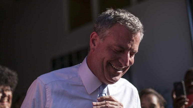 Mayoral candidate Bill de Blasio campaigns at the Red Hook...