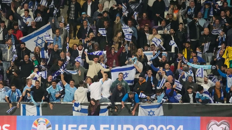 Israel supporters cheer during the Euro 2024 qualifying play-off soccer...