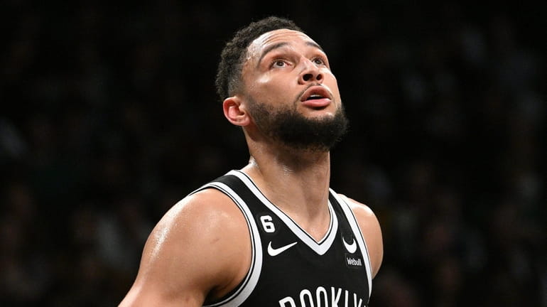 Brooklyn Nets guard Ben Simmons watches a free throw by...