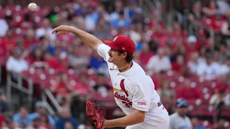 St. Louis Cardinals starting pitcher Miles Mikolas throws during the...
