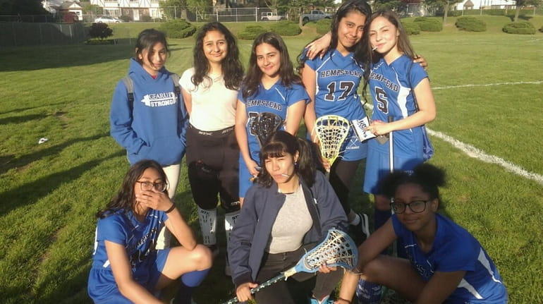 The Hempstead girls lacrosse team in 2019. Bottom row, from left:...