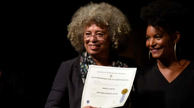 Angela Davis, left, is among 10 people who inducted into...