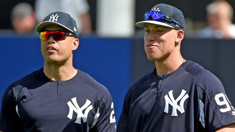Giancarlo Stanton and Aaron Judge at spring training at George...