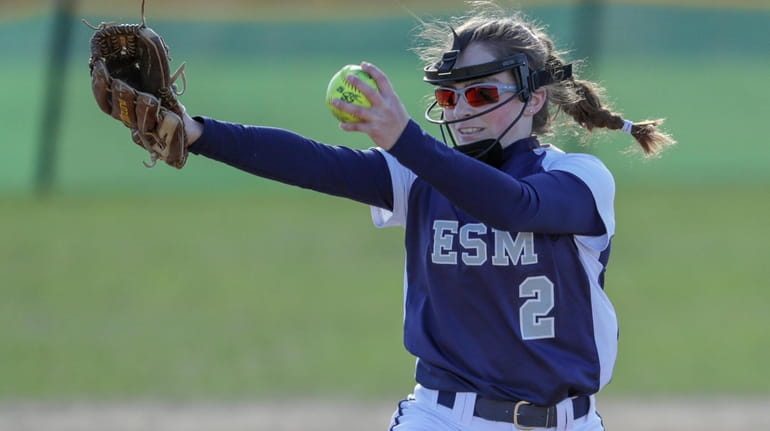 Starting pitcher Nikki Caesar of Eastport-South Manor delivers the ball against...