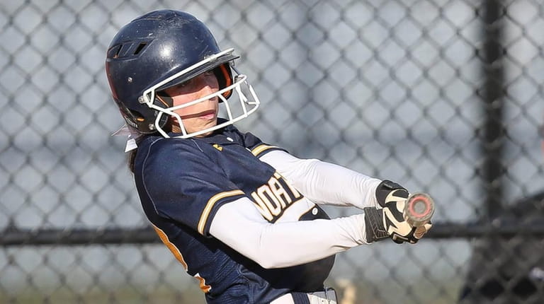 Northport's Zoey Nussbaum hits a home run in the fourth...