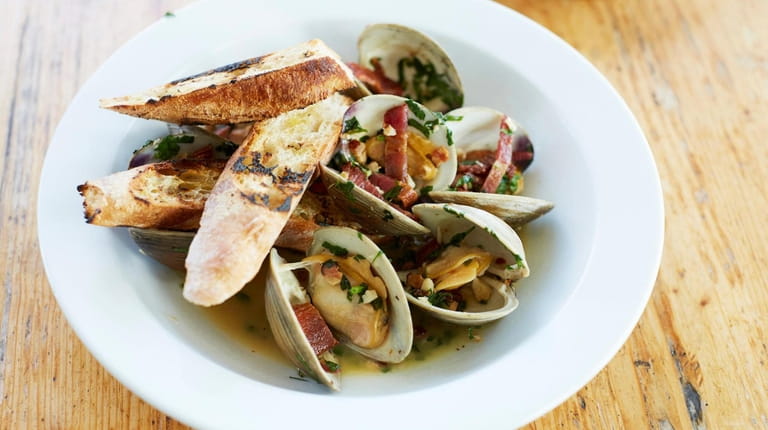 Steamed littleneck clams with chorizo, lemon and parsley at Five...