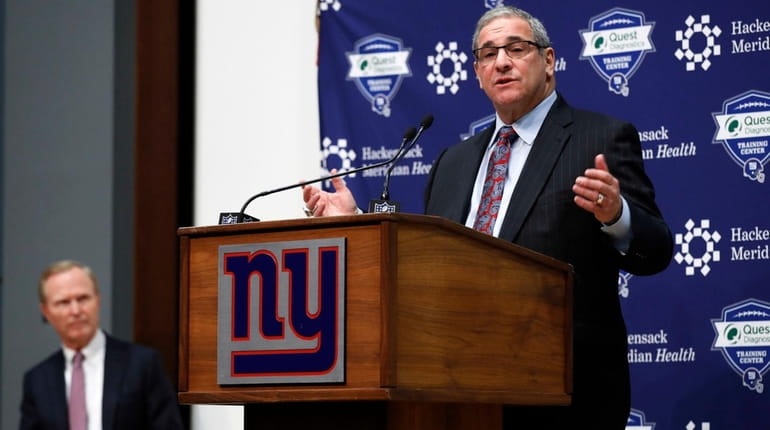 Giants general manager Dave Gettleman speaks after being introduced while...