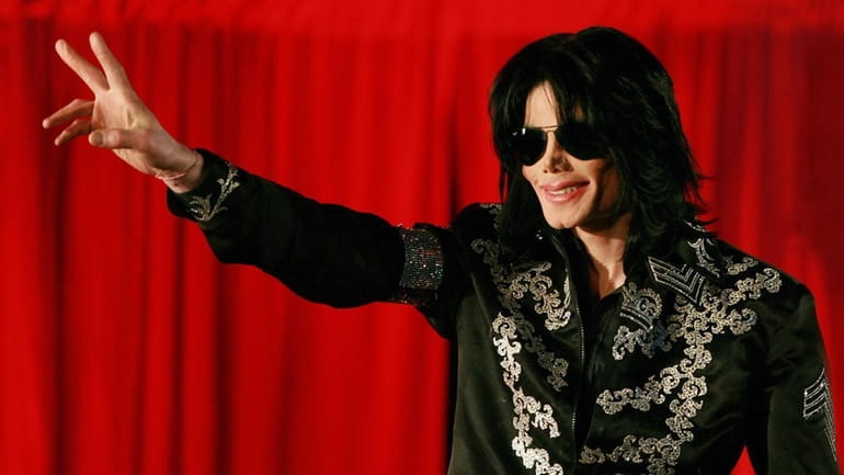 Michael Jackson, pictured at a news conference in London, died...