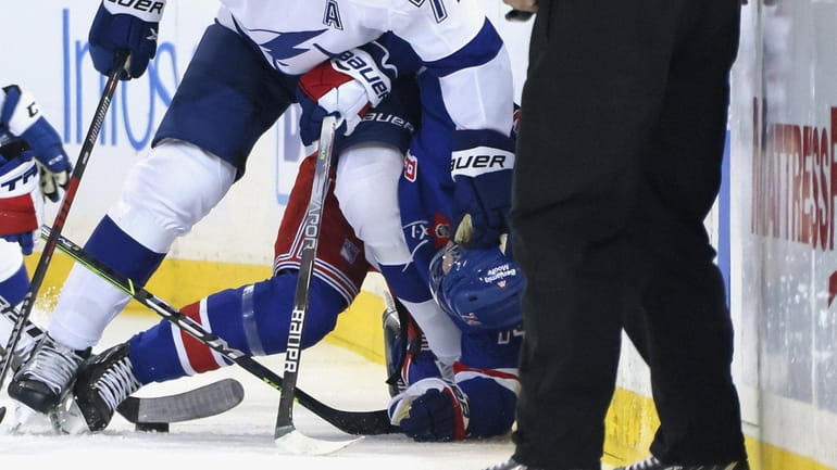 Vitali Kravtsov of the New York Rangers is injured during the...