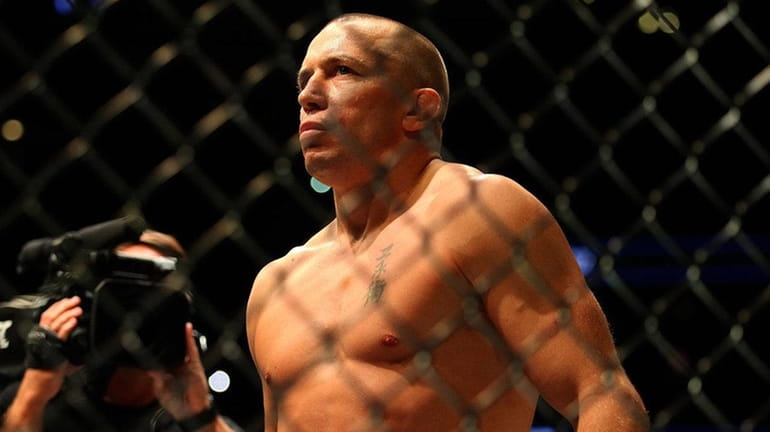 Georges St-Pierre waits to fight Michael Bisping in the middleweight...