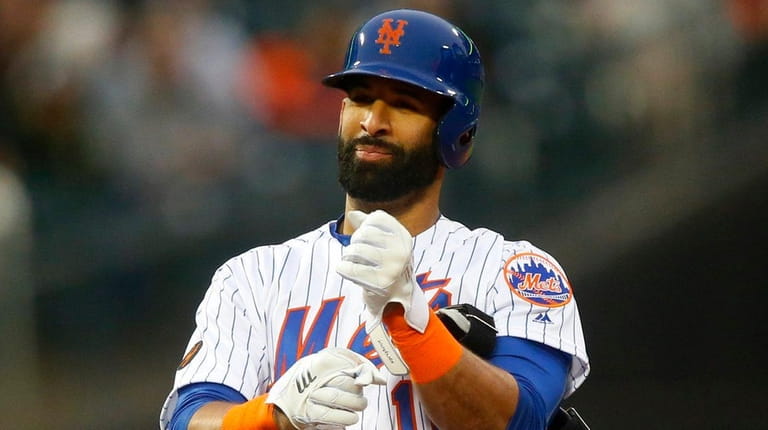 Jose Bautista of the Mets reacts after his double in...