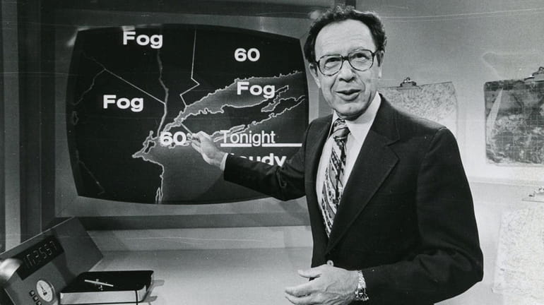 Frank Field shows off his weather map at the NBC...