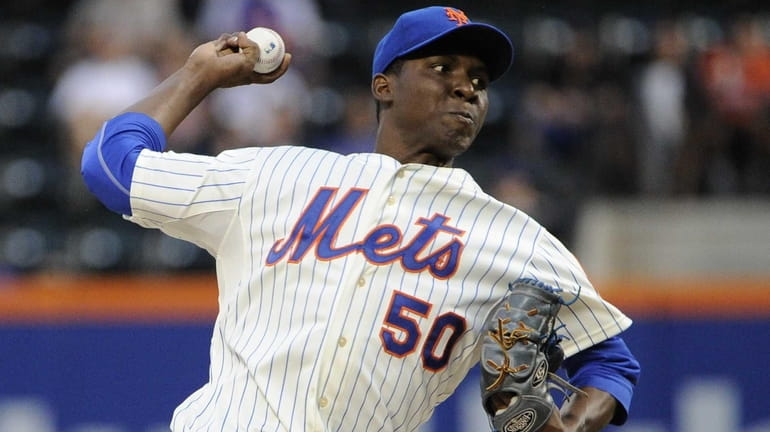 Mets starting pitcher Rafael Montero delivers against the Washington Nationals...