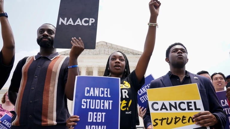 Students demonstrates about student loan debt outside the Supreme Court,...