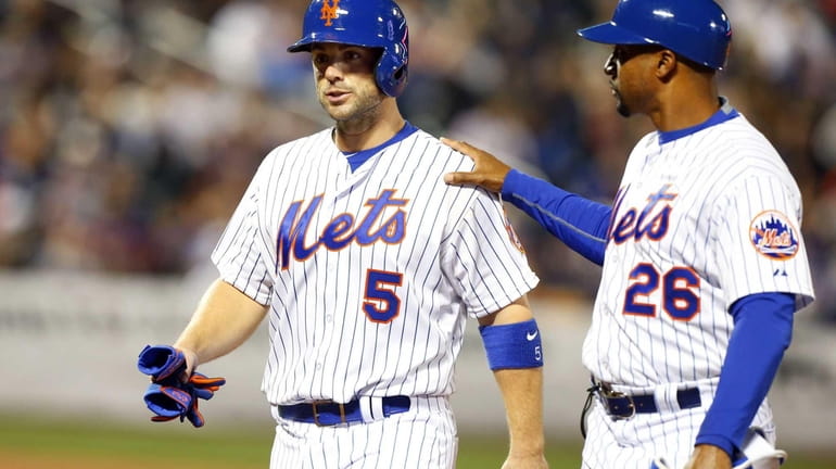 David Wright #5 of the New York Mets leaves a...