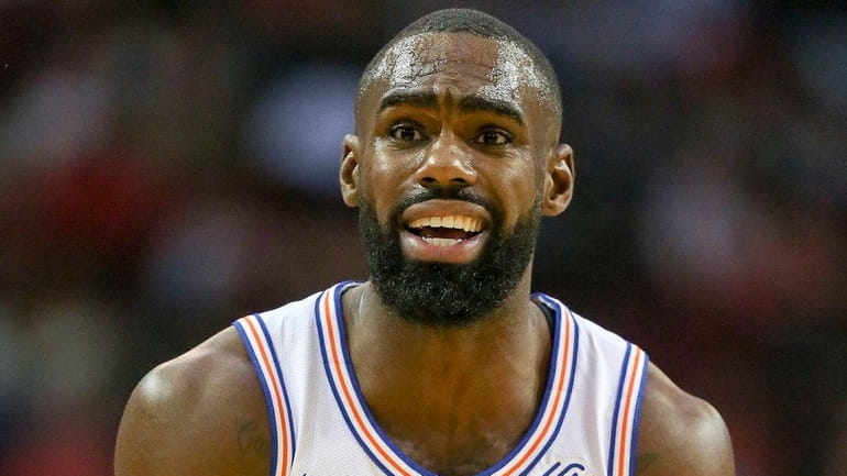 Knicks forward Tim Hardaway Jr. reacts after being called for...