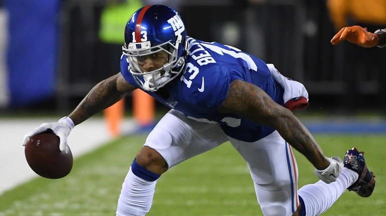 New York Giants wide receiver Odell Beckham runs with the...