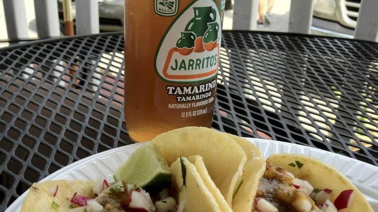 At A Taste of Country in Riverhead, carnitas tacos can...