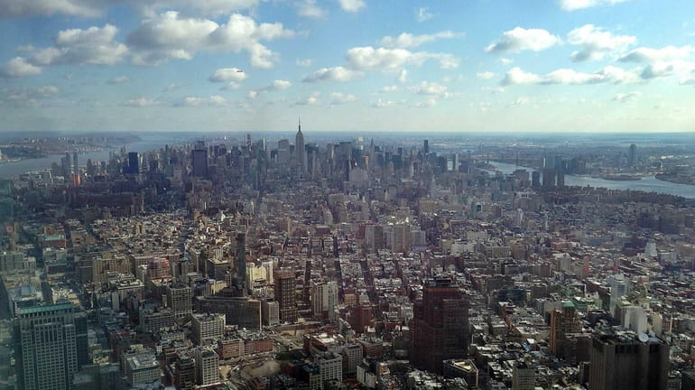 The Manhattan skyline is seen from the One World Trade...