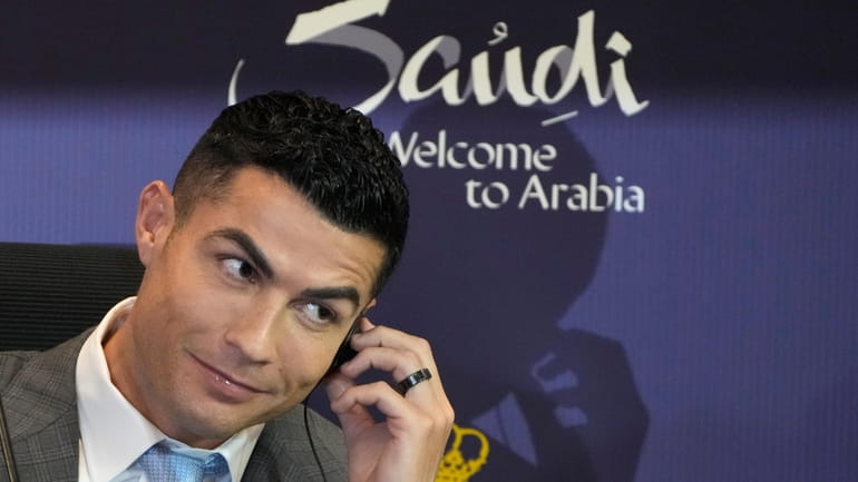 Cristiano Ronaldo speaks during a press conference for his official...