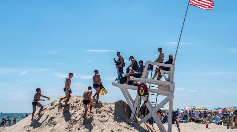 Lifeguards keep watch at Jones Beach on Friday.
